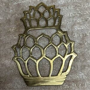 Vintage solid brass pineapple trivet.